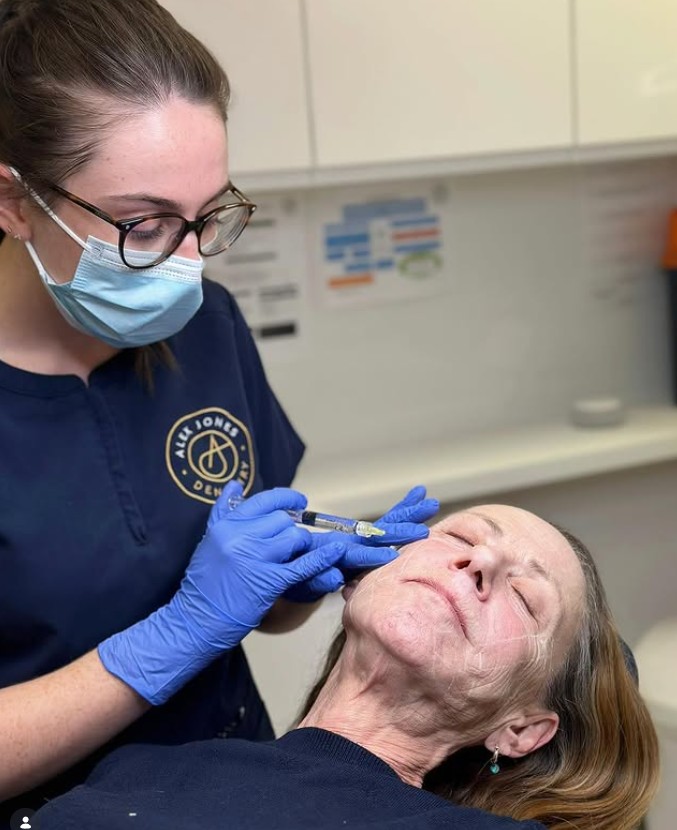 Laura performing a facial aesthetics treatment at her Wakefield clinic